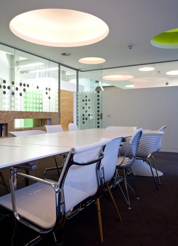 Modern conference room with polka dot design for collaborative meetings at Graeae Theatre.