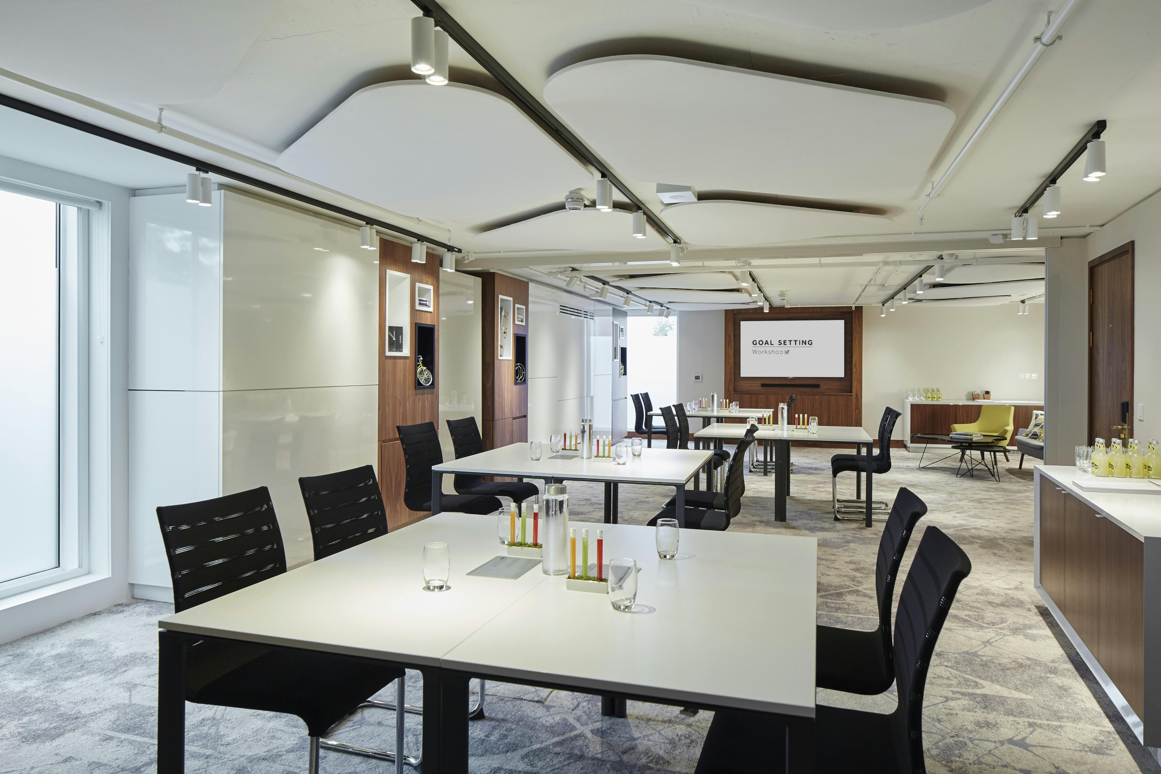 Modern meeting space at London Heathrow Marriott, ideal for corporate events and workshops.