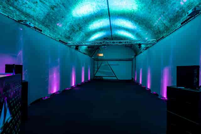 Versatile event space in Aures London with vibrant lighting for corporate and private parties.