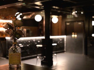 Stylish Whiskey Jar Basement venue with modern bar, perfect for gatherings and events.