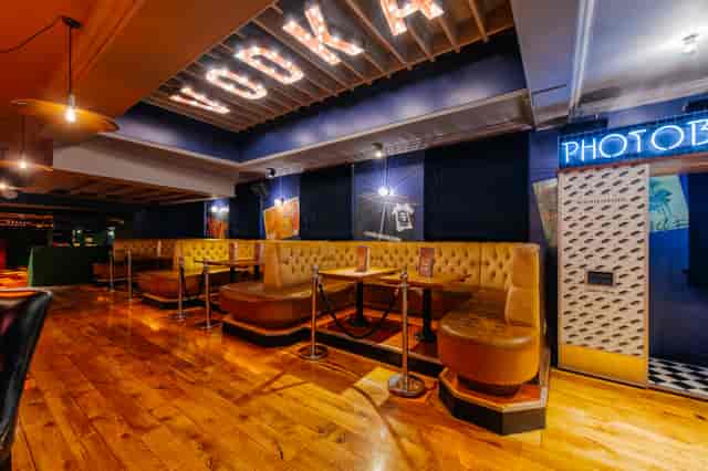 Stylish Clubroom in Revolution Cambridge, ideal for cocktail receptions and networking events.