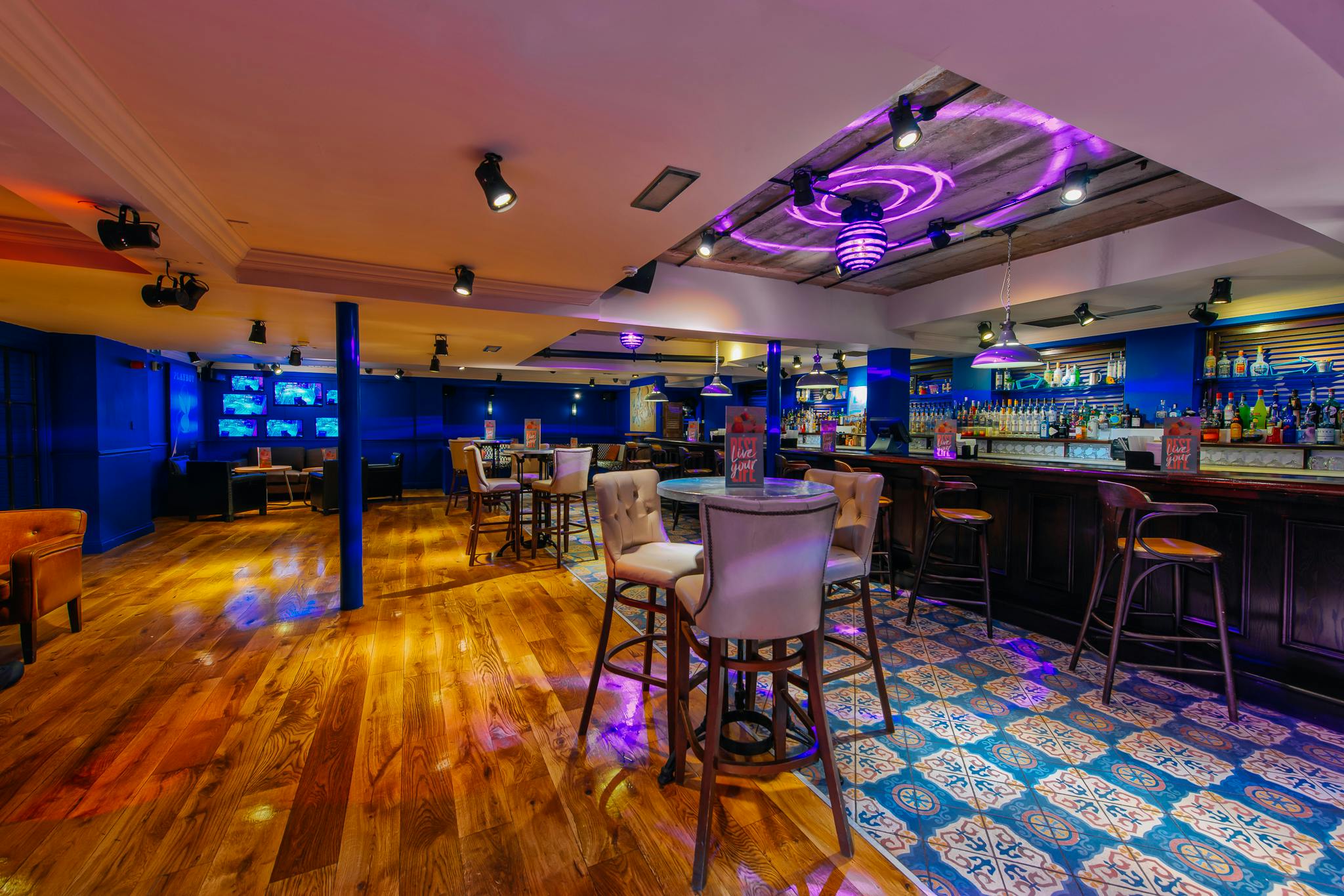 Vibrant Lounge Bar in Revolution Cambridge, perfect for social gatherings and networking events.