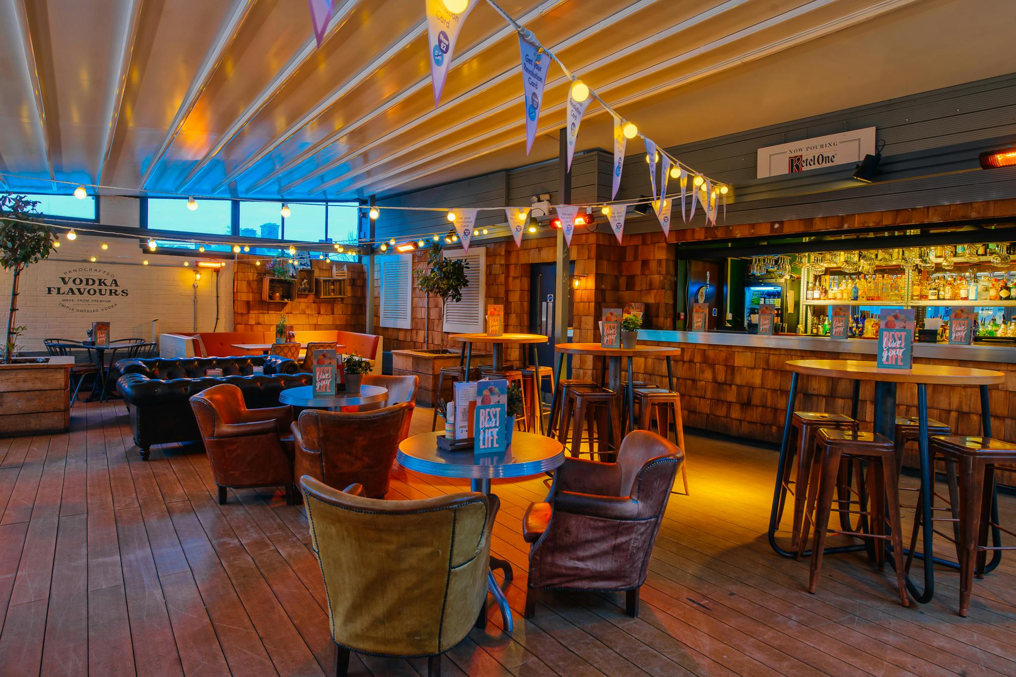 Rooftop Bar in Revolution Cambridge, vibrant event space for gatherings and networking.