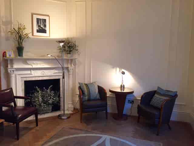 Cozy consulting room with armchairs for professional meetings and informal discussions.