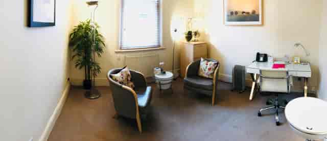 Cozy meeting room with soft lighting for client consultations and brainstorming sessions.