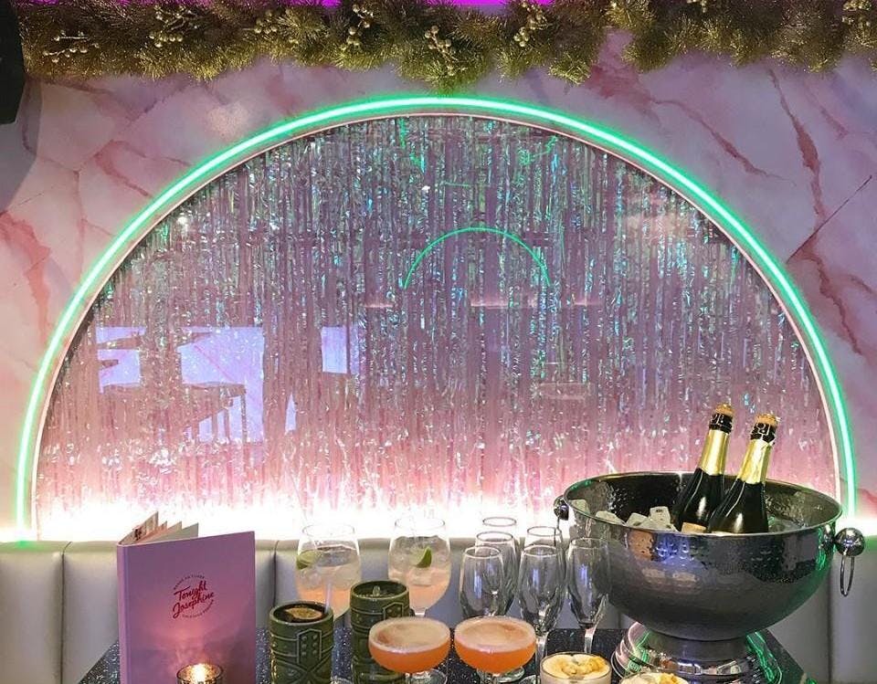 Stylish event setup at Tonight Josephine Shoreditch with elegant champagne display.