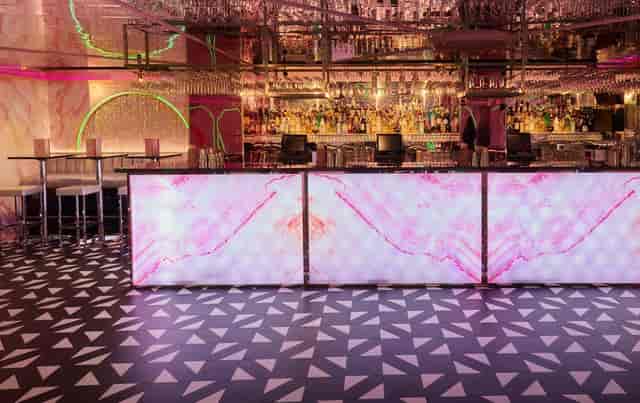 Vibrant bar area at Tonight Josephine Shoreditch, ideal for upscale cocktail receptions.