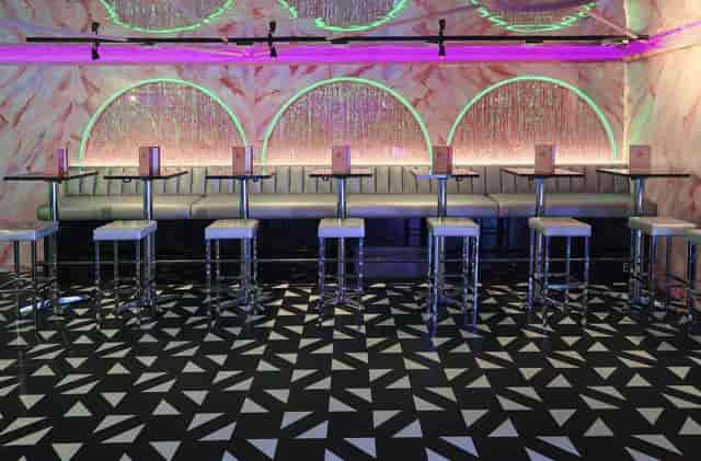 Stylish event space at Tonight Josephine Shoreditch with sleek bar seating for cocktail receptions.