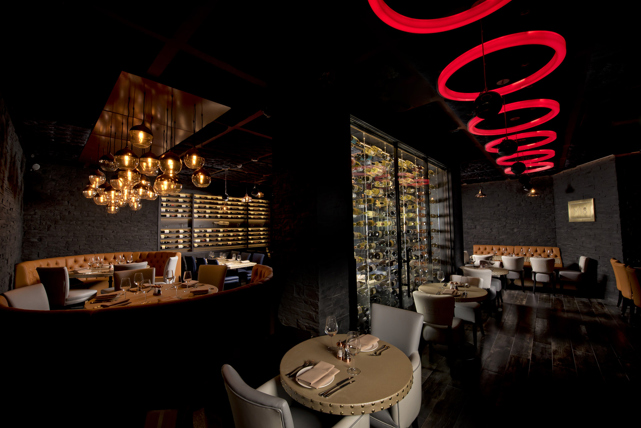 Bowling lanes in a stylish restaurant, perfect for corporate events and celebrations. - Banner