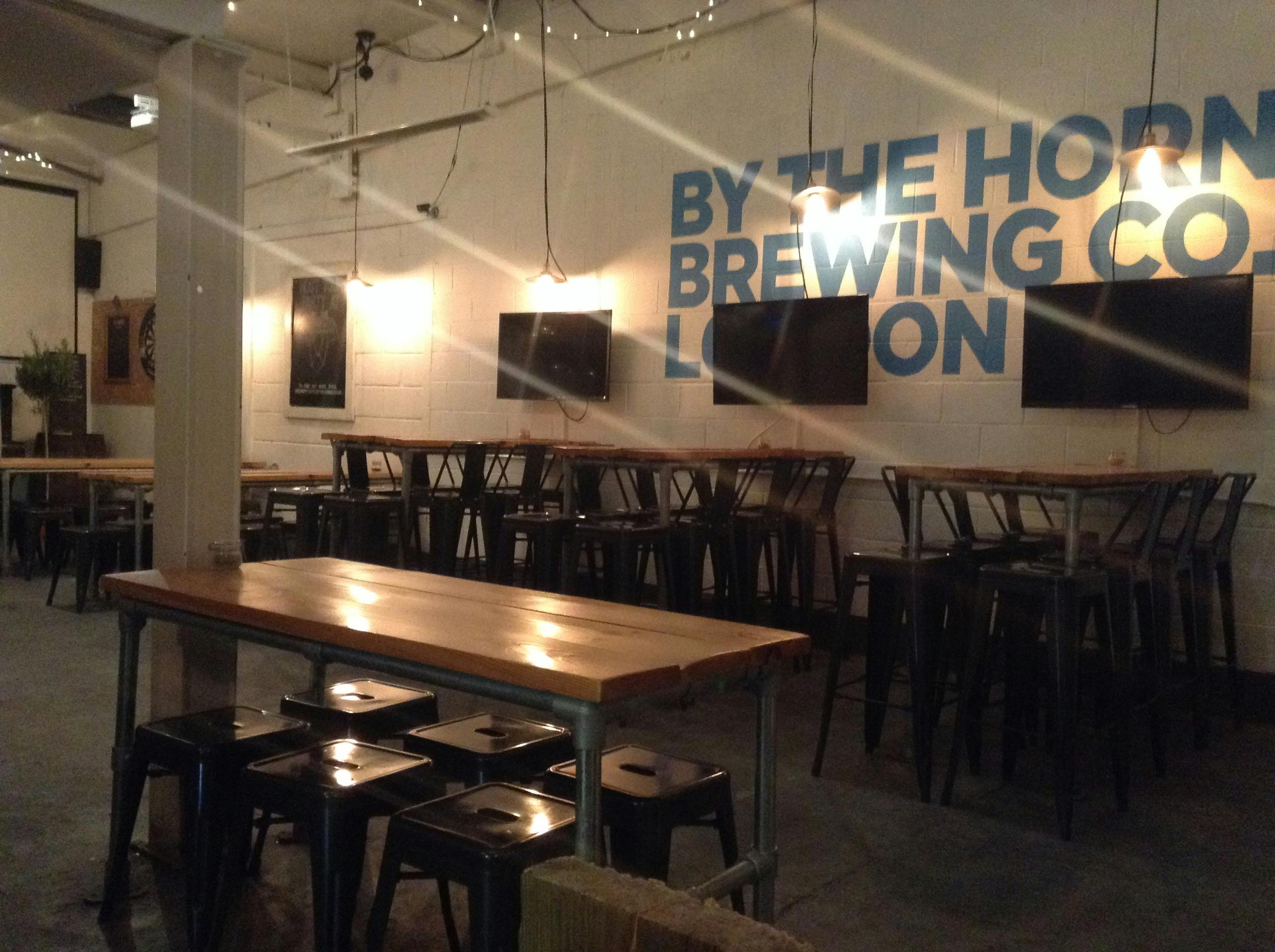 Taproom Bar at By The Horns Brewing Co., ideal for casual gatherings and networking events.