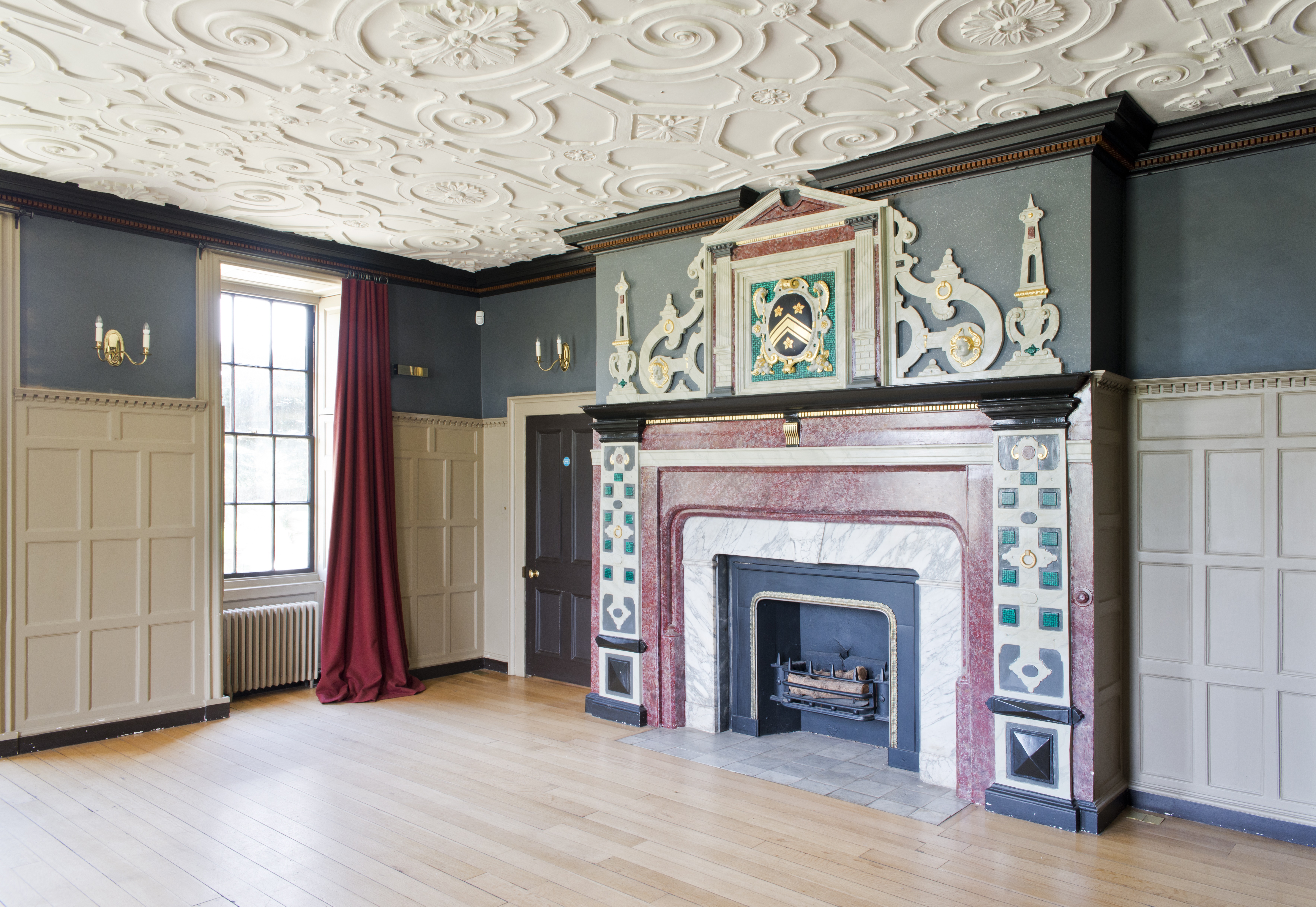 Great Hall at Forty Hall Estate: elegant meeting room with ornate fireplace for events.