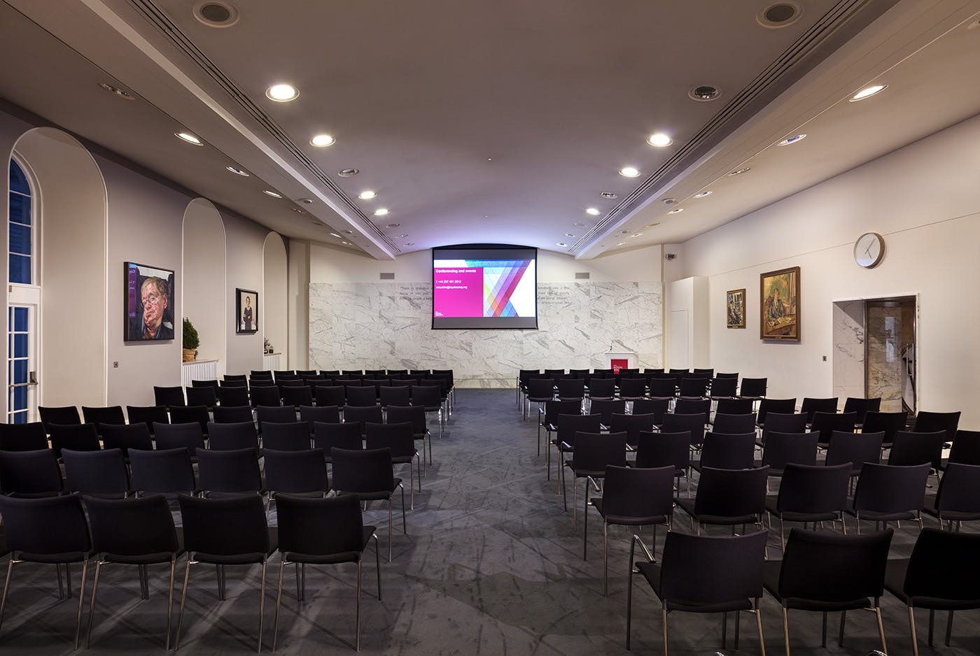 Modern conference room at The Royal Society with ample seating for presentations.