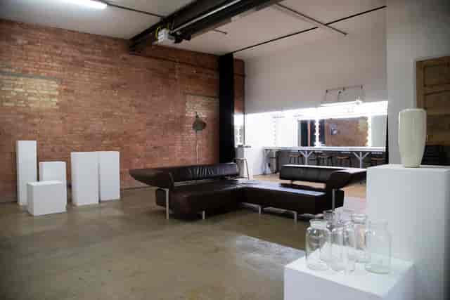 Versatile event space in Bow Bunker, East London with exposed brick and natural light.