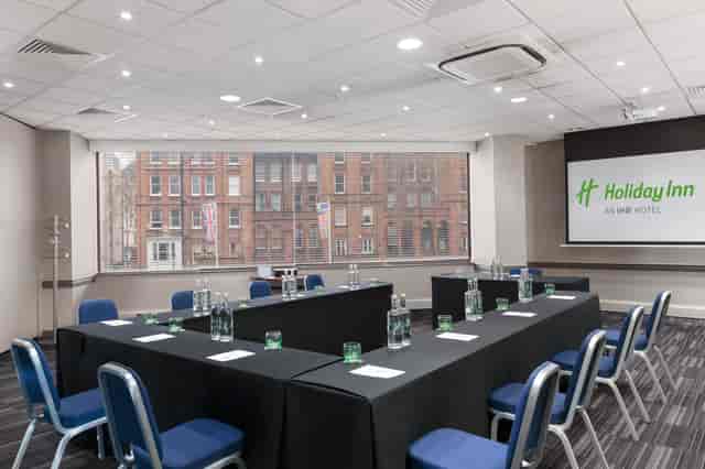 Madonna in a bright meeting room at Holiday Inn, perfect for corporate events and workshops.