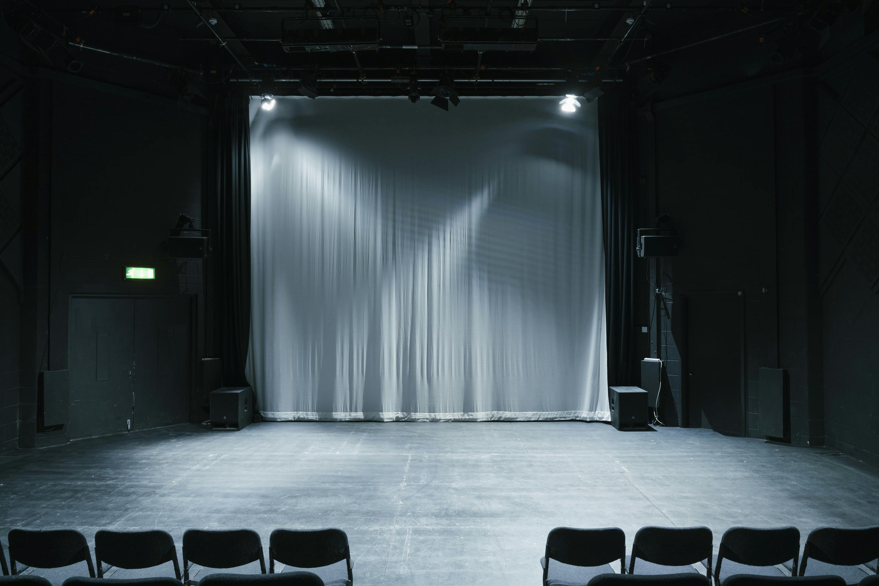 Versatile stage setup in Contact Theatre, ideal for performances and workshops.