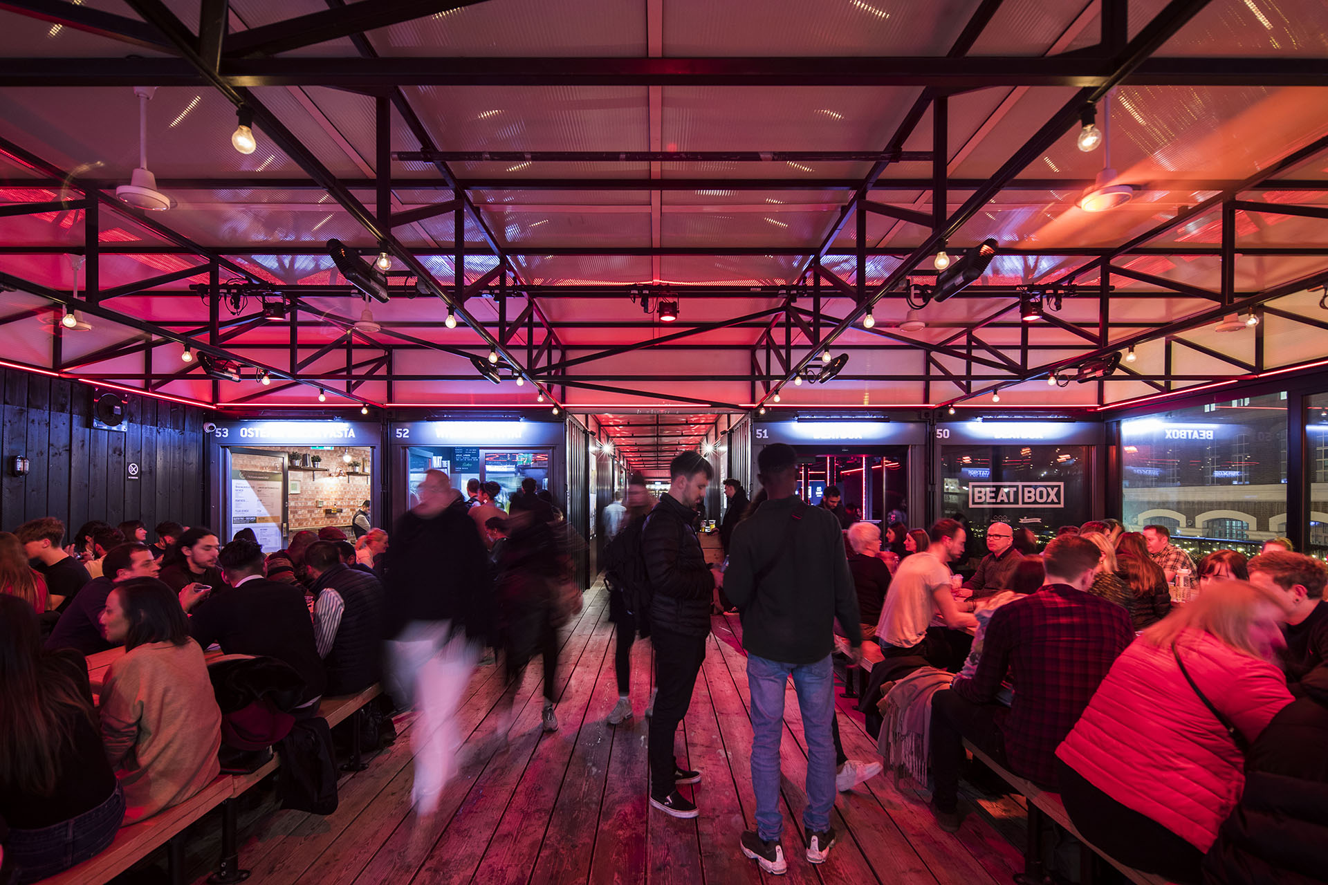 Vibrant networking event at BeatBox, Boxpark Shoreditch with flexible seating. - Banner