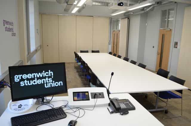 Modern Board Room in Dreadnought with long table for collaborative meetings and presentations.