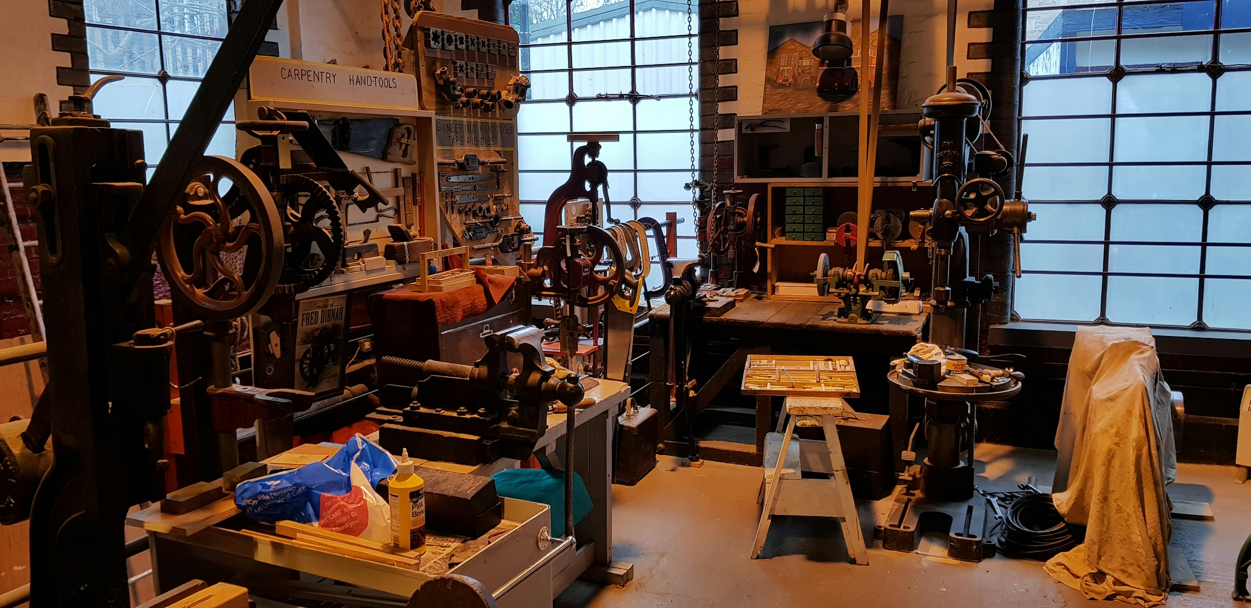 Victorian Pumphouse workshop with tools, ideal for creative team-building events.