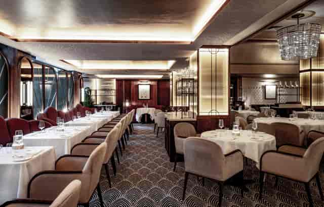 Sophisticated dining space at Savoy Grill for upscale events and meetings.