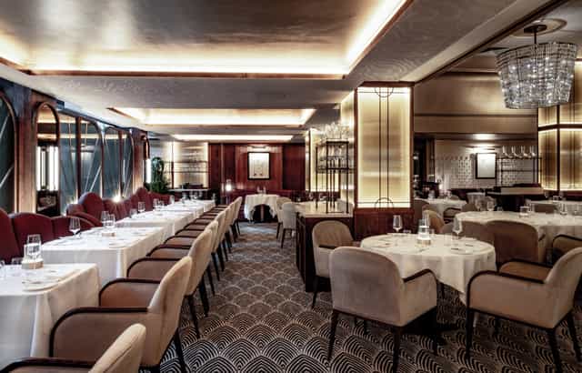 Sophisticated dining space at Savoy Grill for upscale events and meetings.