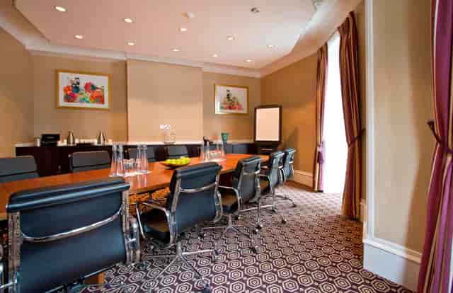 Regal Board Room at St Ermin’s Hotel, featuring a sleek conference table for meetings.