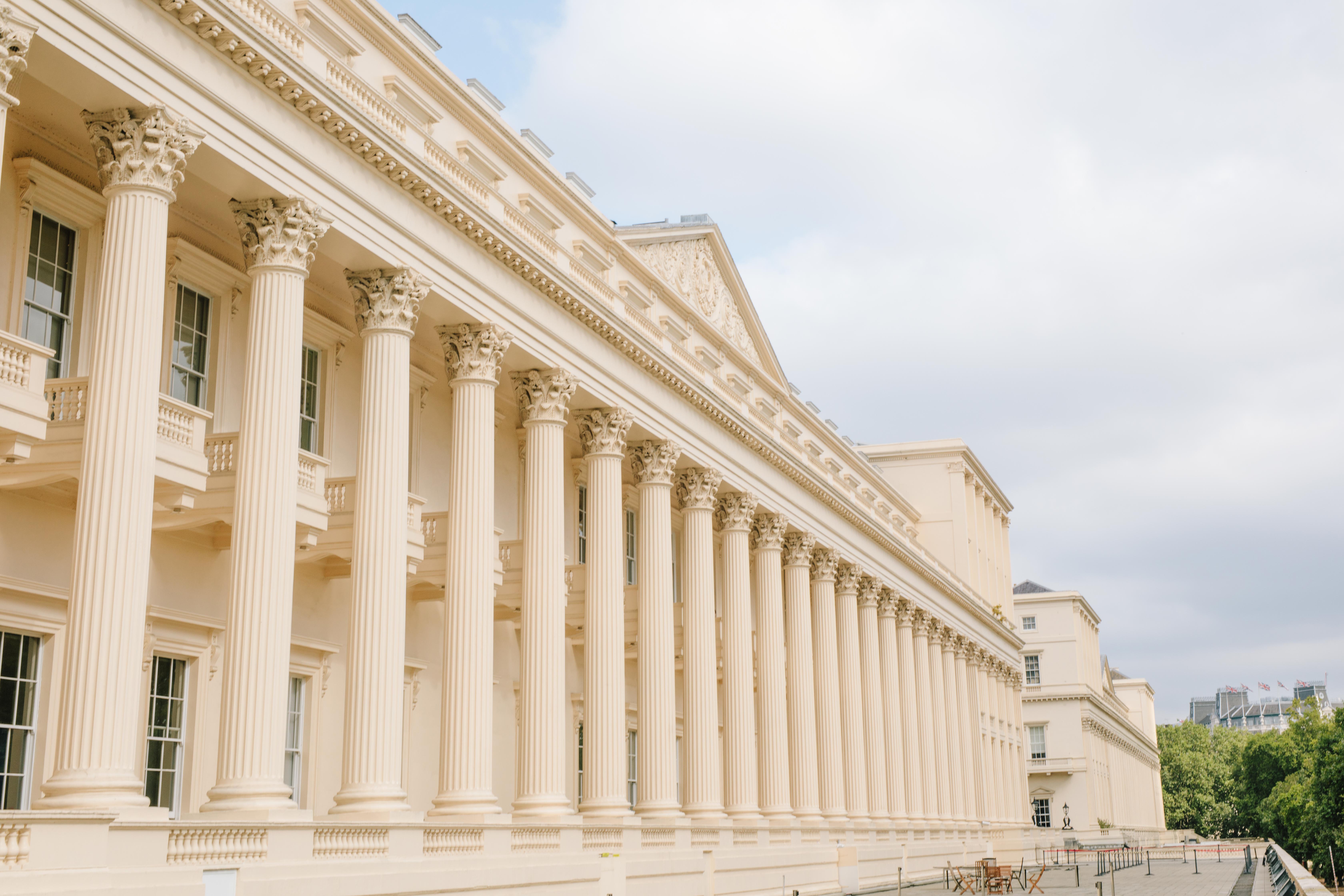 Elegant Prince Philip House with columns, perfect for upscale weddings and corporate events. - Banner