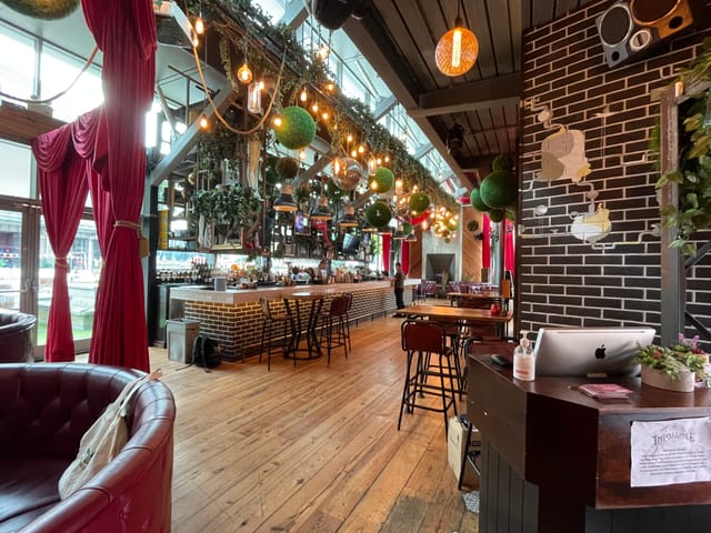 Vibrant Impossible Bar with stylish decor, ideal for events and gatherings.
