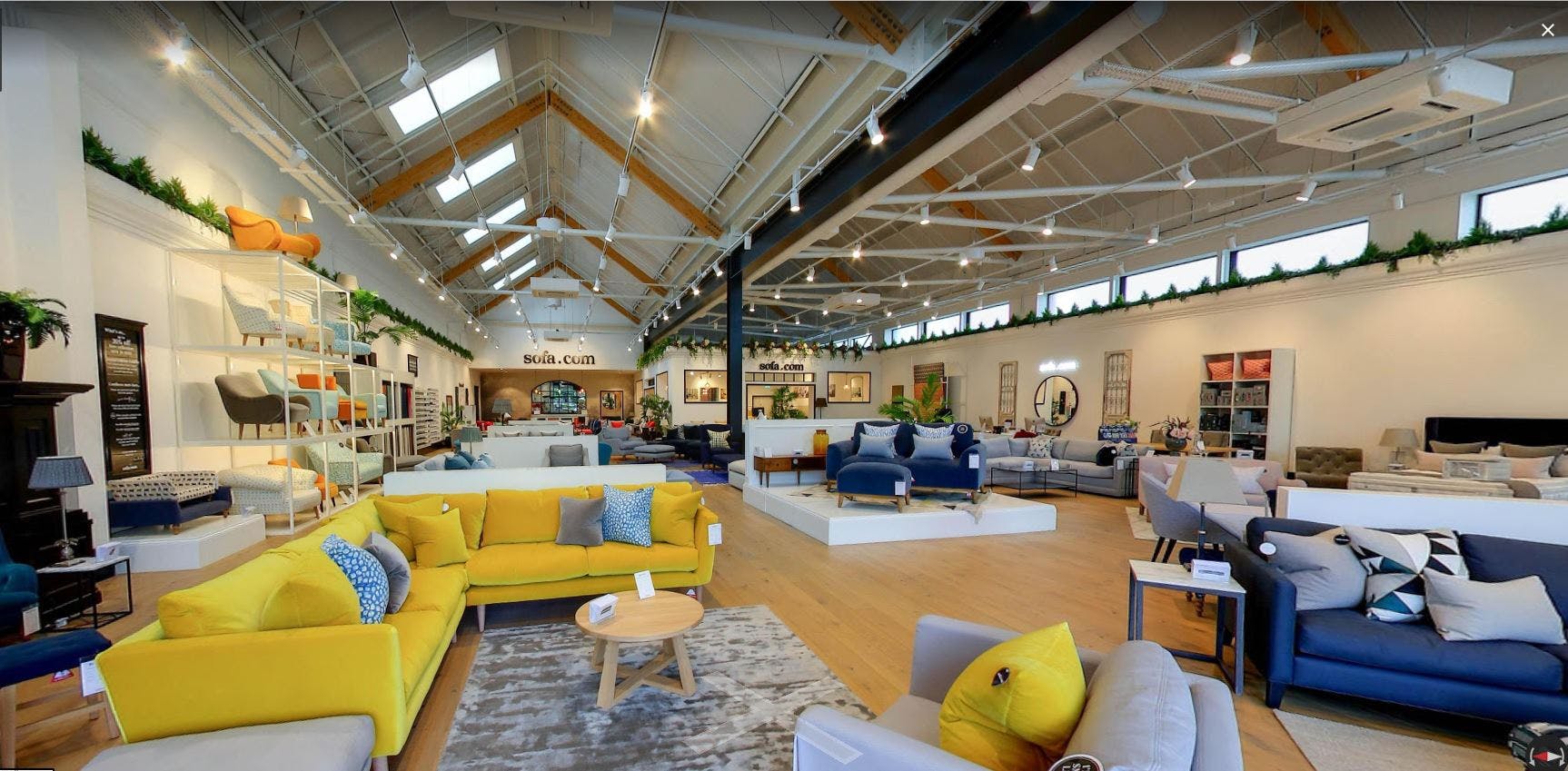 Spacious Sofa.com Harrogate showroom with stylish furniture for events and product launches.