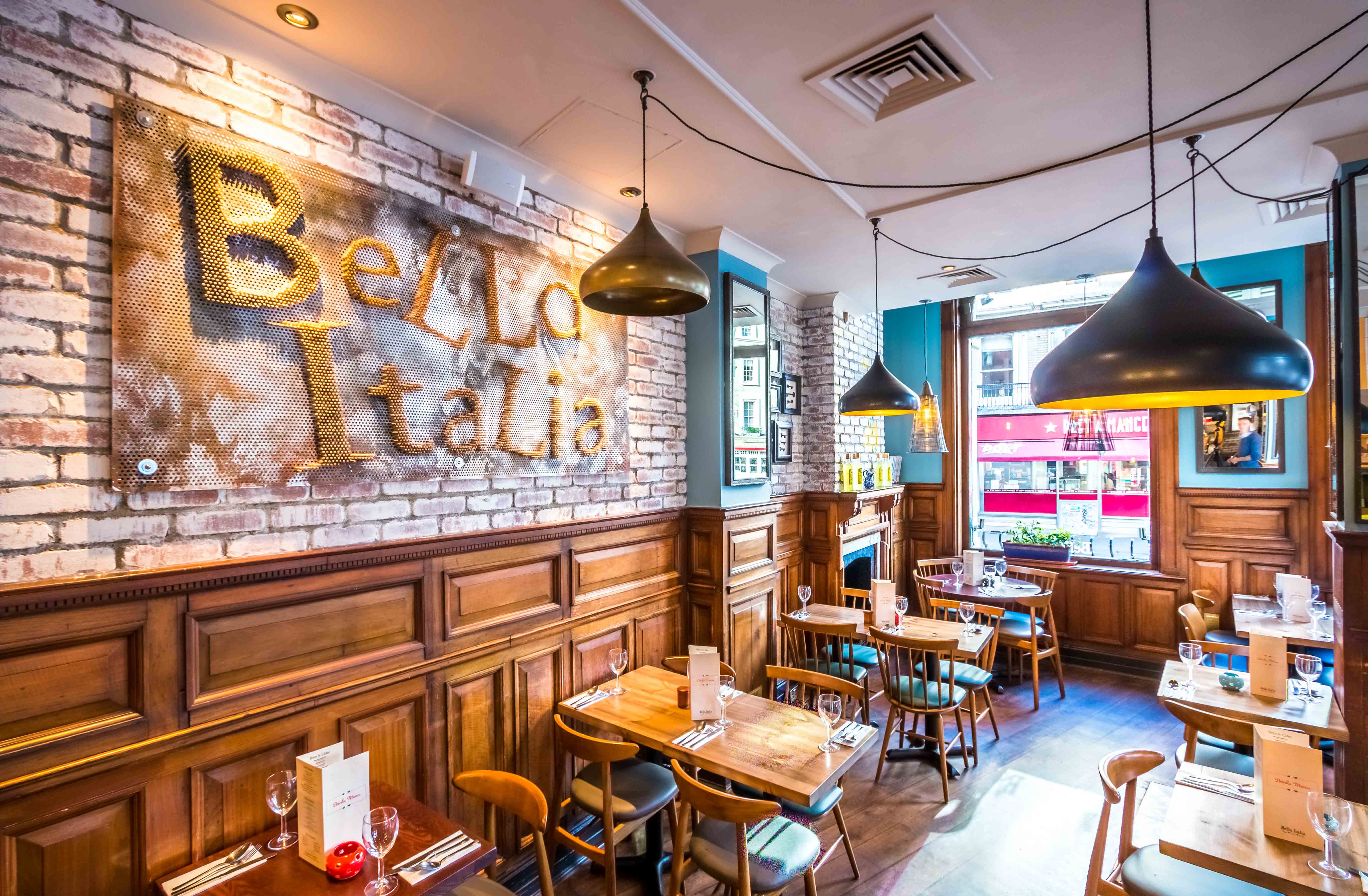 Charming Bella Italia venue with warm decor for intimate gatherings and corporate events. - Banner