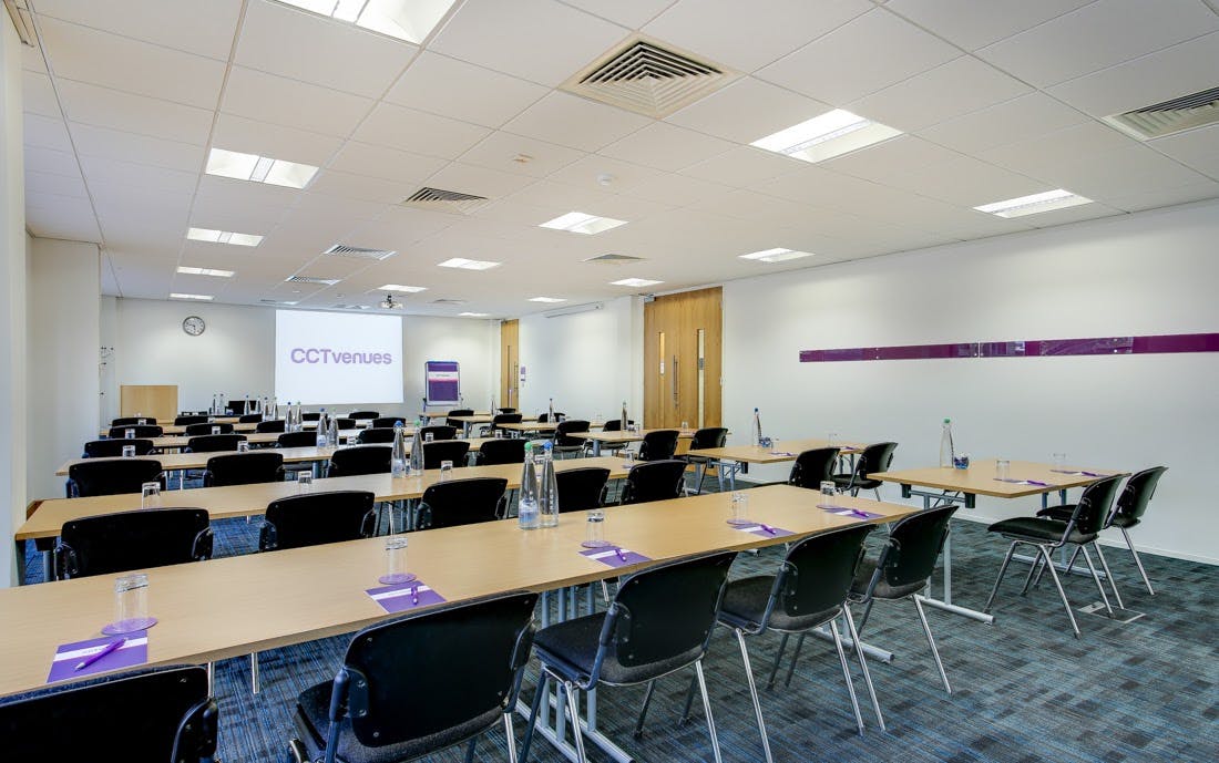 Meeting room setup at CCT Venues Barbican, ideal for professional events and presentations.