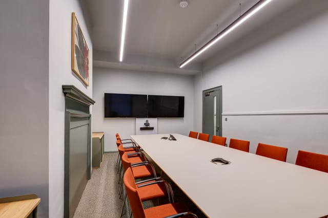 Modern boardroom, tech, executive meeting venue