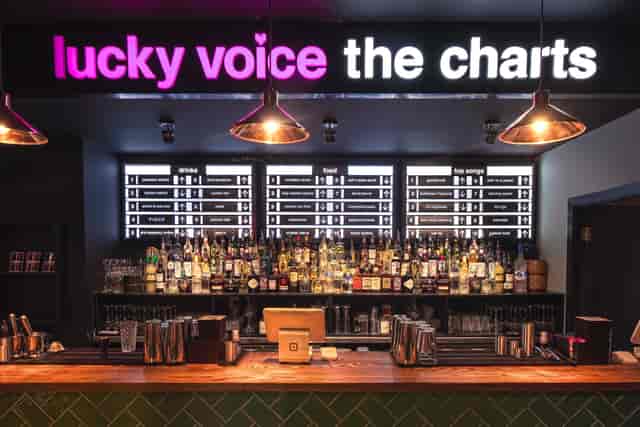 Vibrant bar area at Lucky Voice Holborn, ideal for social events and gatherings.