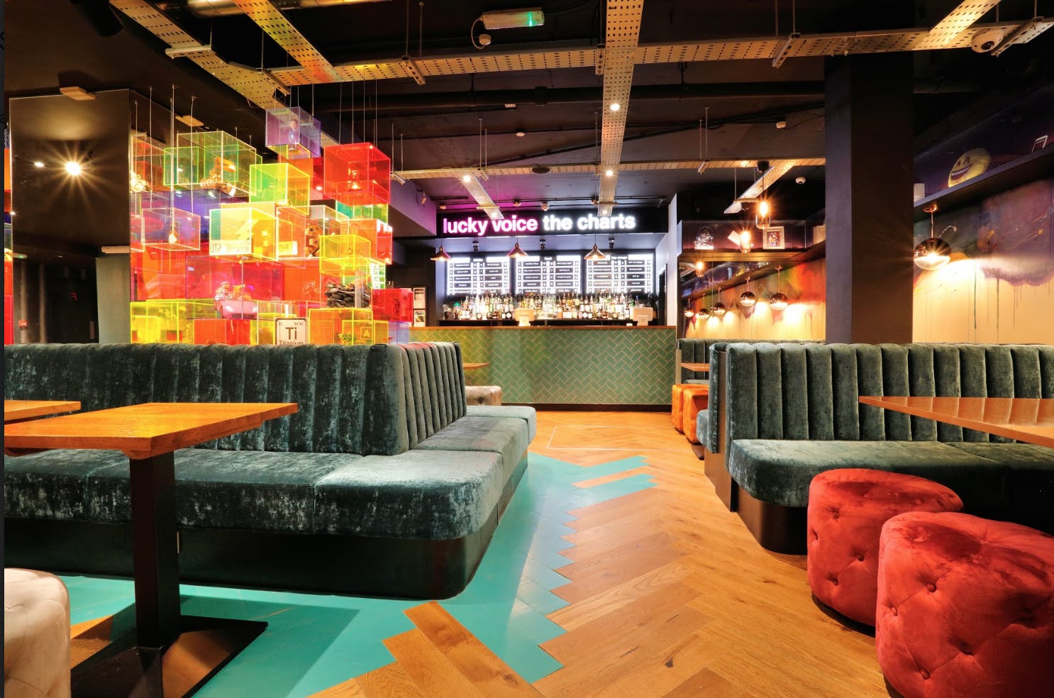 Vibrant bar area with colorful decor, ideal for events and gatherings at Lucky Voice Holborn.