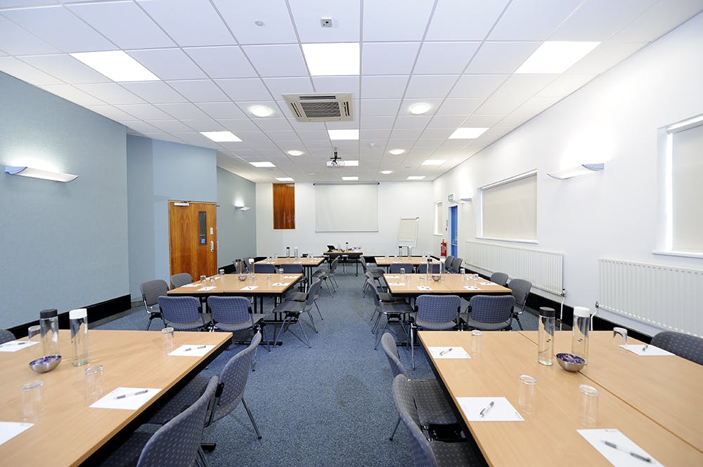 Well-lit meeting room in Fielder Centre, ideal for workshops and professional events.