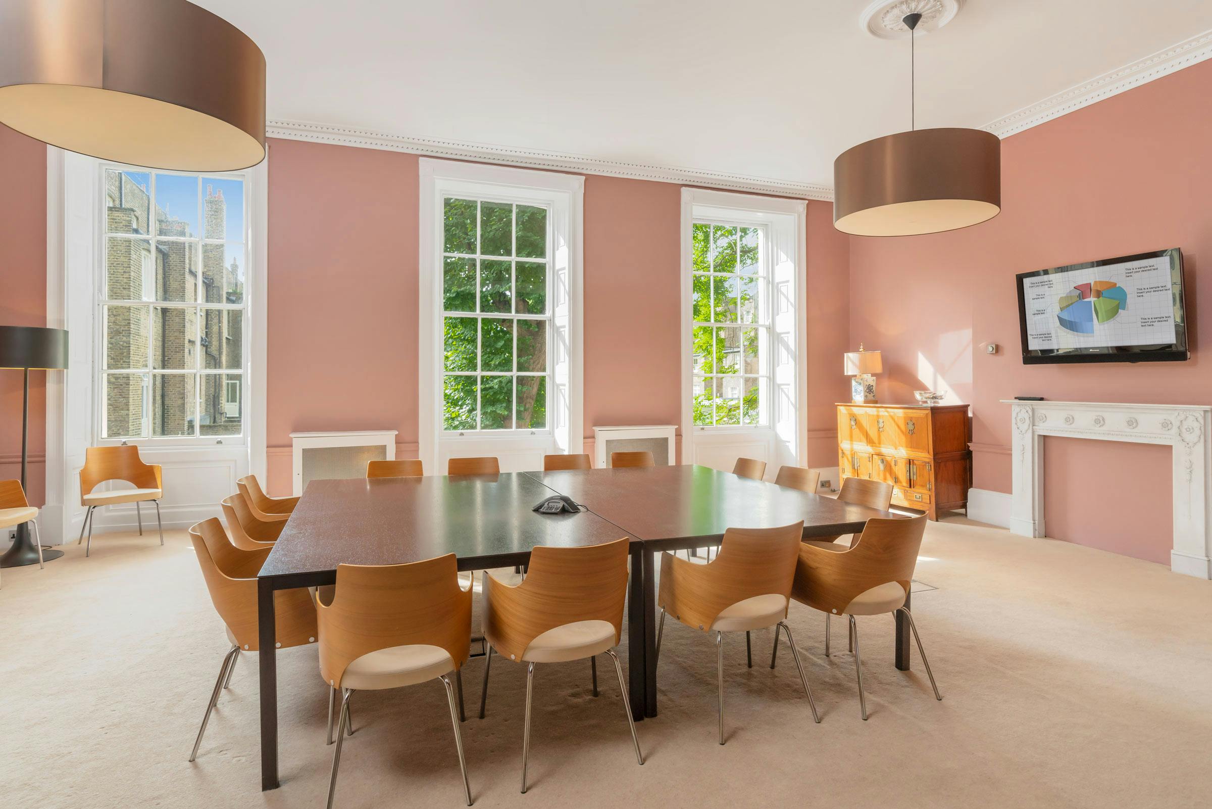Russell Square Meeting Room with large table, ideal for meetings and brainstorming sessions.