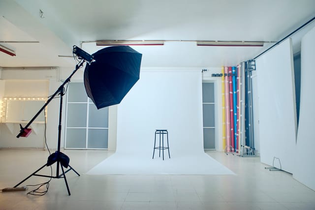 Versatile Unit B Studio venue with clean backdrop, ideal for events and meetings.