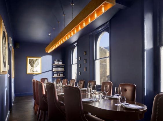 Sophisticated private dining room with elegant decor for corporate events in The Distillery.