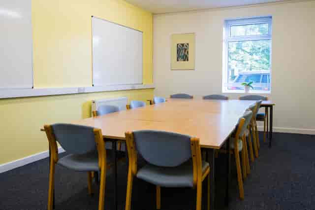 Training Room 1 at Wesley House, Salford: bright, collaborative space for workshops and meetings.