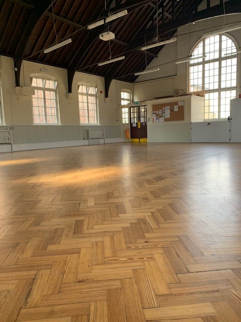 Spacious Upper Hall in Hargrave Hall, ideal for workshops and receptions with polished flooring.