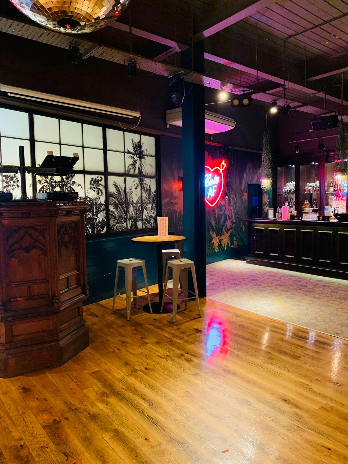 Vibrant event space with stylish bar for networking and social gatherings in Revolution Cardiff.