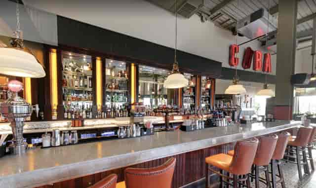 Stylish bar area at Revolucion De Cuba Milton Keynes for networking events and meetings.
