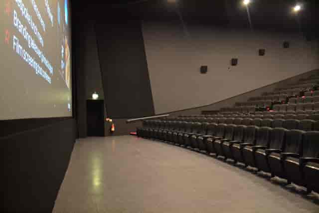Modern Cineworld Wembley Screen 9 with tiered seating for corporate events and screenings.