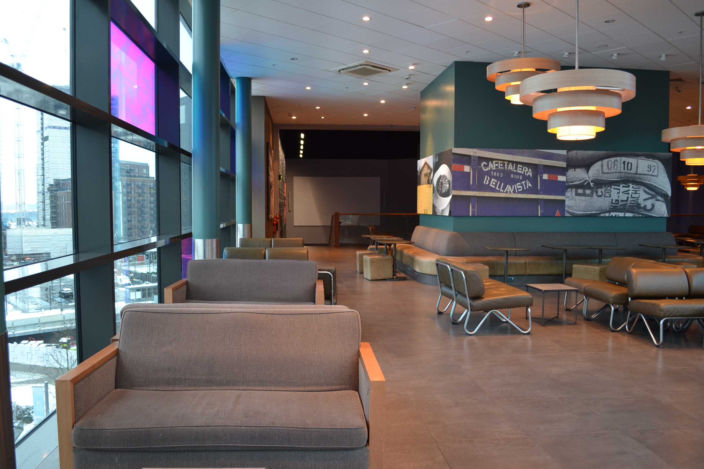 Modern lounge area in Cineworld Wembley for networking and meetings. - Banner