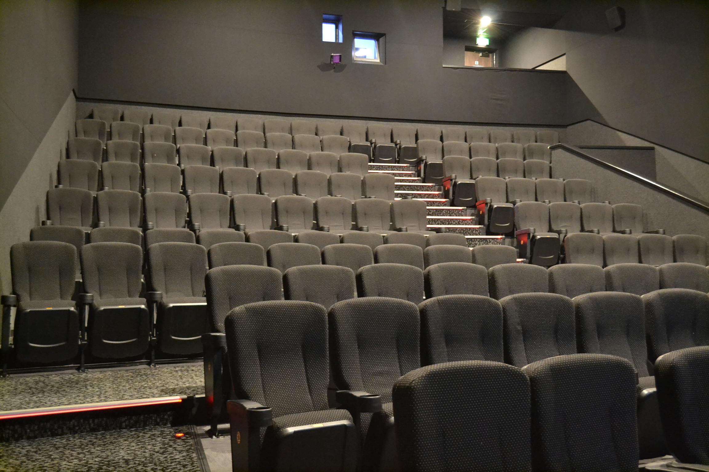 Spacious Cineworld Wembley auditorium with tiered seating for presentations and conferences.