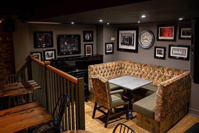 Cozy meeting space with plush seating for intimate gatherings at The Spice of Life.