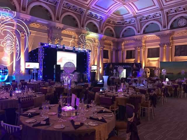 Elegant event space at Bristol Harbour Hotel with round tables for corporate dinners.