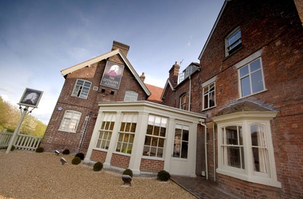 Function Room at The Lyttelton Arms, featuring large windows for events and meetings.