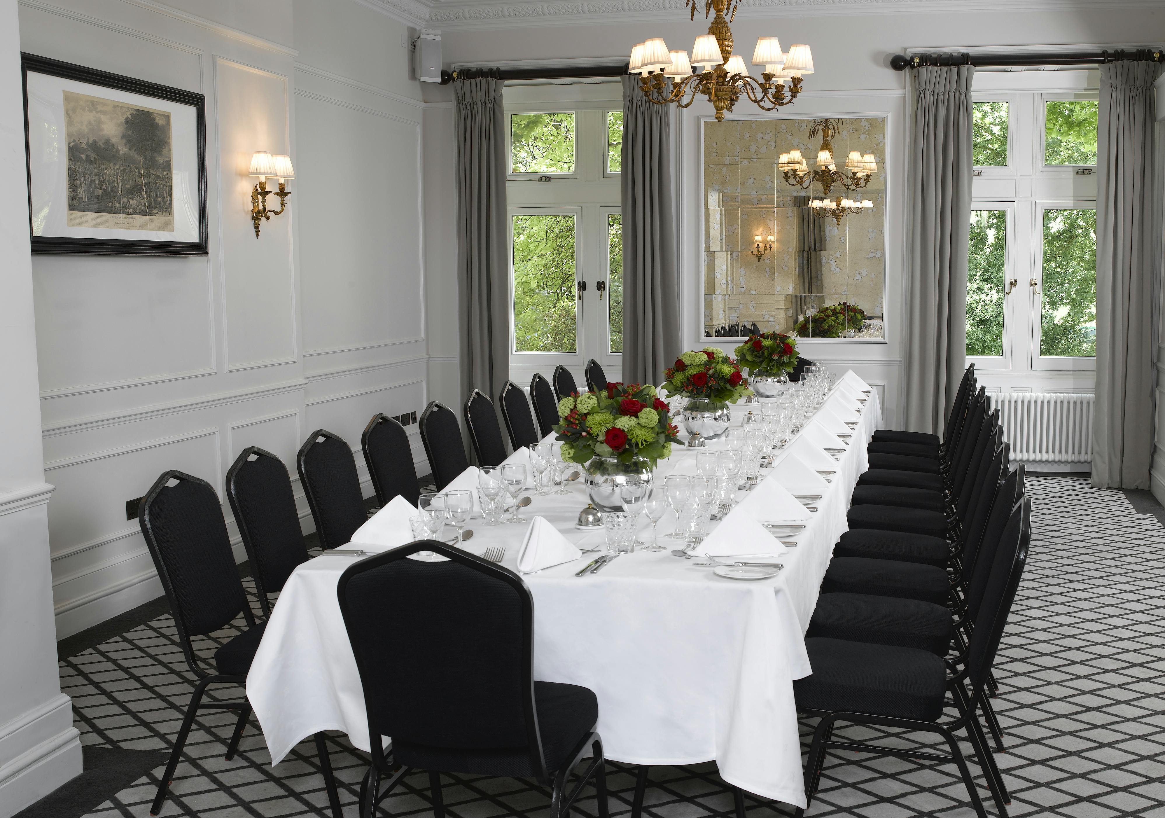 Hudson Room at The Farmers Club, elegant dining setup for corporate meetings.