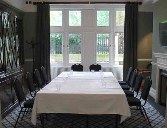 The Committee Room at The Farmers Club, featuring a long table for meetings and events.