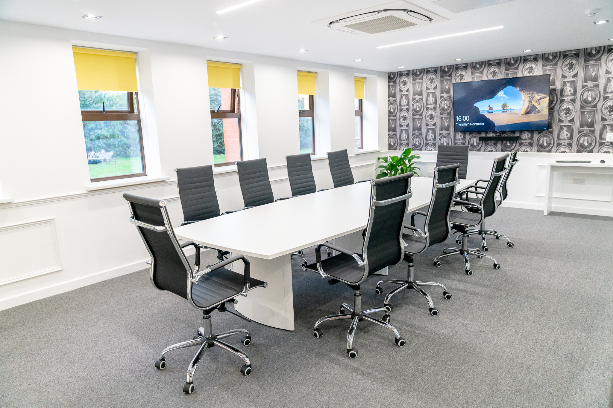 Modern conference room in Foundry House, Widnes with spacious table and ergonomic chairs. - Banner